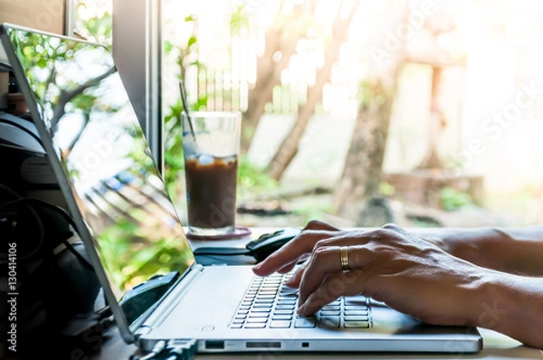 Obraz Hands typing on laptop computer