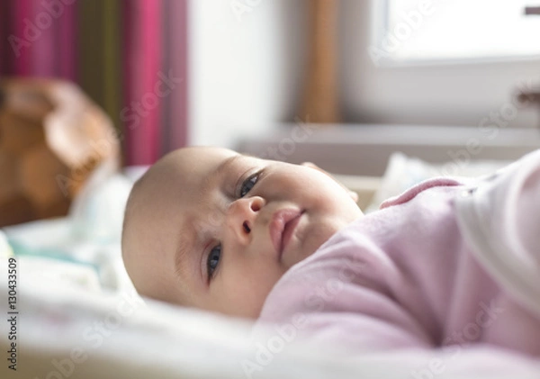 Obraz Portrait of a smiling baby laying