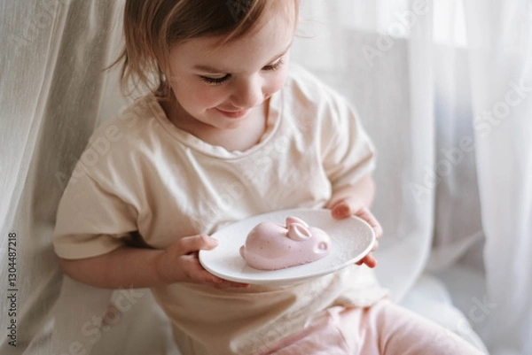 Obraz little girl and healthy easter sweets - jelly bunny