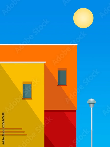 Fototapeta Petits immeubles oranges et jaunes avec réverbère éclairage public sous ciel bleu et soleil d'été dans le Sud de la France. Typique du Sud de la France.