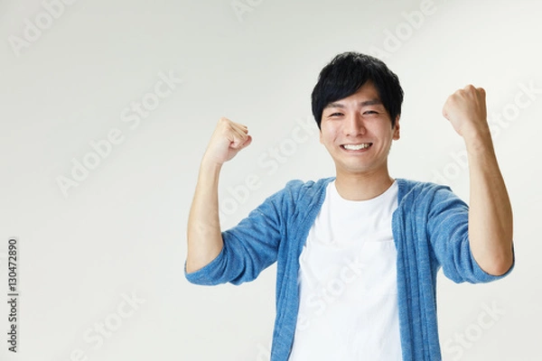 Obraz ガッツポーズする男性