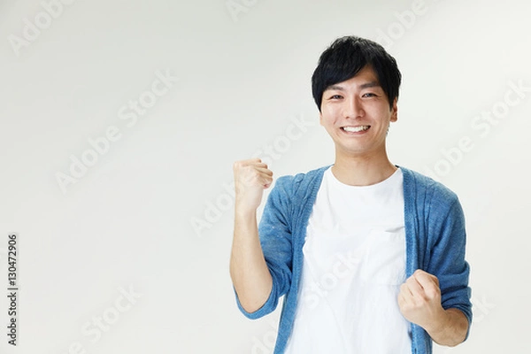 Obraz ガッツポーズする男性