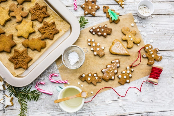 Obraz Homemade Christmas gingerbread cookies on wooden rustic background. 