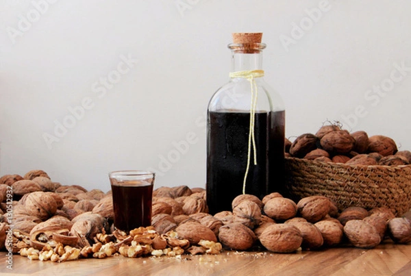 Obraz Walnut spirit. Homemade alcoholic drink made from walnut and rum.