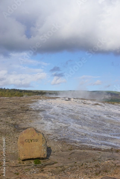 Fototapeta Haukadalur, Iceland: Stone marker at the site of the dormant Geysir hot spring, from which all geysers take their name.