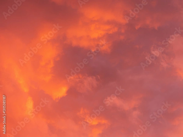Fototapeta Dramatic sky with clouds. Mysterious abstract background pattern texture. Many yellow and orange tones and patterns of clouds.