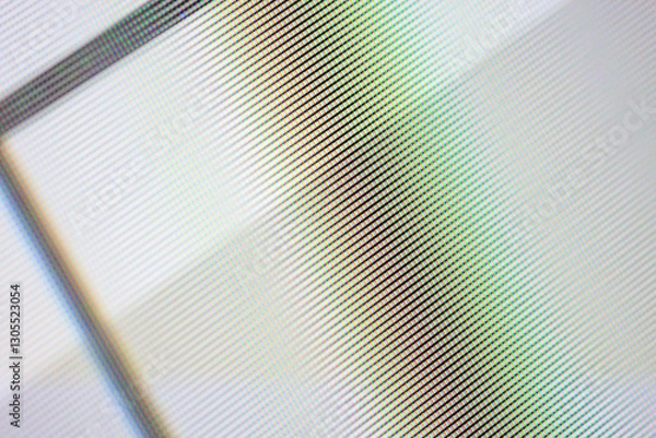 Obraz A close-up view shows a grid pattern with diagonal lines that are pastel colors. The lines create a textured visual effect that resembles pixelation or a digital screen.