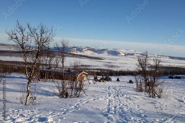Obraz Stunning sunset view over Kiruna city and mine with snow covered trees in Swedish Lapland