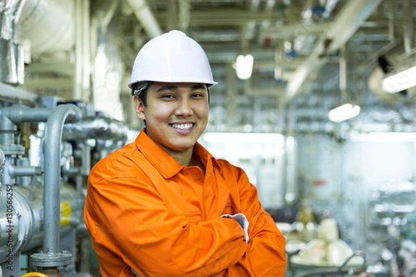 Obraz Happy asian engineer in workshop