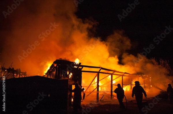 Obraz Fireman extinguish fire in homes and buildings