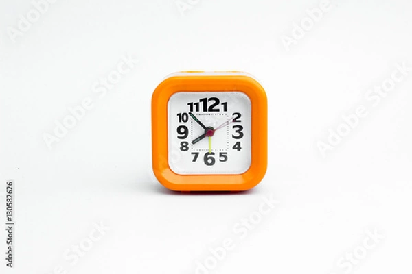 Fototapeta Clock orange with white backdrop..Orange clock on a white backgr