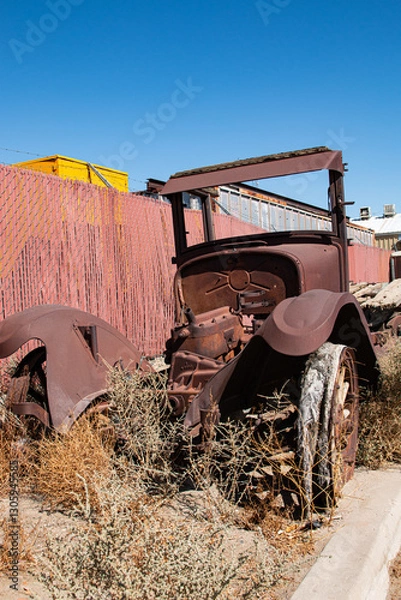 Fototapeta Front view of the remains of an antique Model T flatbed truck.