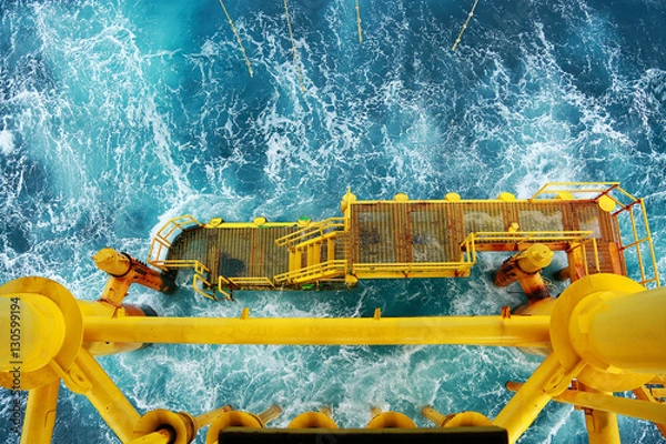 Fototapeta Offshore construction platform for production oil and gas. Oil and gas industry and hard work. Production platform and operation process by manual and auto function from control room.