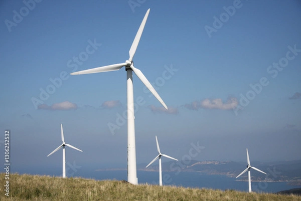 Fototapeta Many wind turbine in meadow. Wind turbines installed in open areas. Wind turbines as alternative energy sources