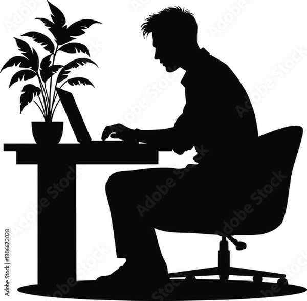 Fototapeta Silhouette of a person working on a laptop at a desk.