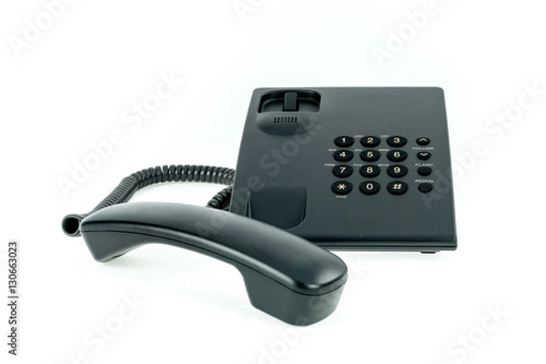 Fototapeta Black office phone with handset near isolated on the white background