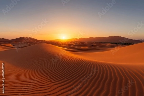 Fototapeta Vibrant golden light casting long shadows over the undulating sands of a desert, capturing the ephemeral beauty of nature during the magical hours of sunset.