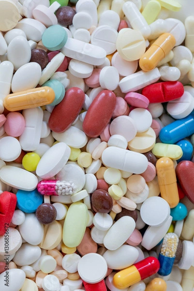 Obraz Close up of collection of colorful tablets pills capsules. Macro view