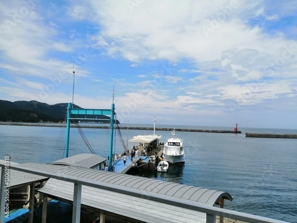 Fototapeta It says "Naruto" in Japanese. In the Naruto Strait, Tokushima Prefecture, Japan, the ocean creates swirling waves due to special tidal currents.
