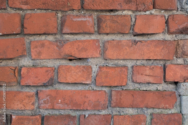 Fototapeta Red brick vintage wall with horizontal masonry. Background