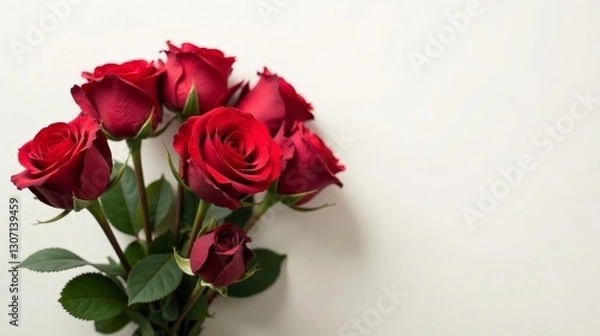 Fototapeta A captivating bouquet of deep red roses, elegantly arranged against a minimalist white backdrop, showcasing the exquisite beauty of nature's vibrant blooms.
