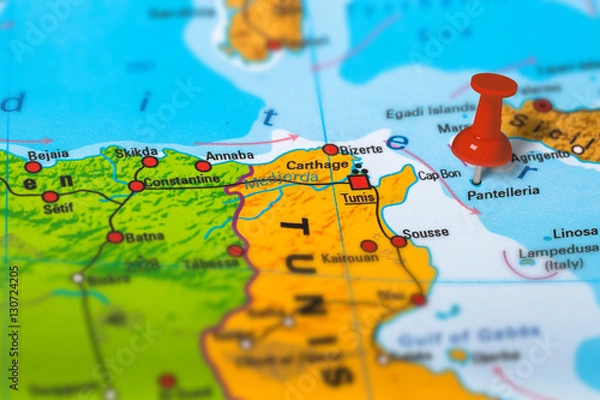 Fototapeta Pantelleria island in Italy pinned on colorful political map of Europe. Geopolitical school atlas. Tilt shift effect.