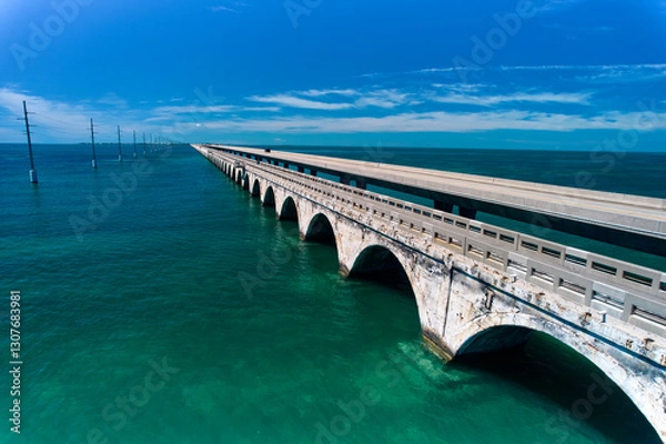 Fototapeta The old Aquaduct at the beginning of the Long Key Historic Bridge Trailhead in the Florida Keys between Long Key and Duck Key is a tourist and travelers paradise