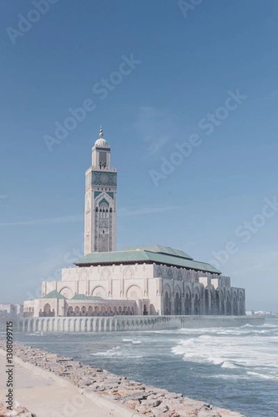 Fototapeta The Hassan II Mosque in Casablanca, Morocco, stands majestically on the coast, 