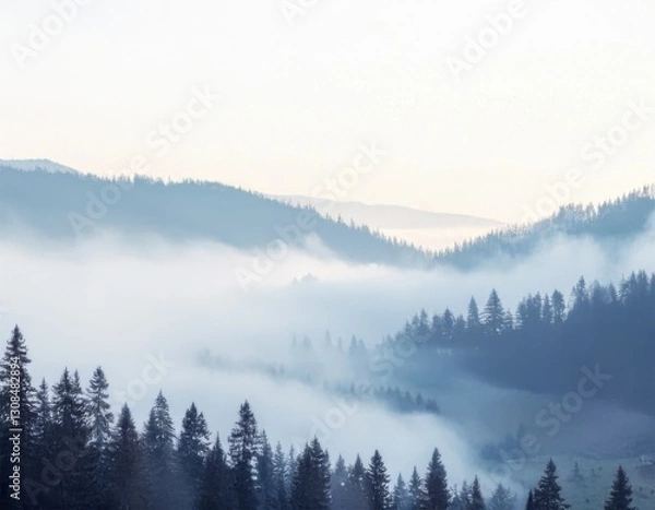 Fototapeta peaceful mountain landscape with mist rolling over pine trees, in a soft, muted color palette perfect for backgrounds