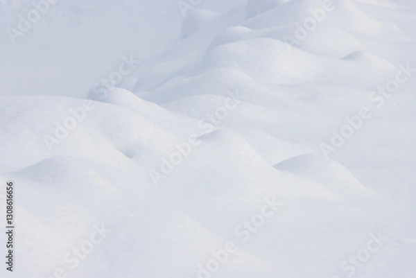 Fototapeta Small mounds of white snow abstract winter landscape background