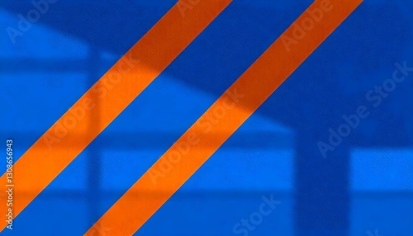 Obraz A textured background featuring diagonal stripes in deep blue and vibrant orange. The interplay of light and shadow creates depth, enhancing the abstract quality of the design.