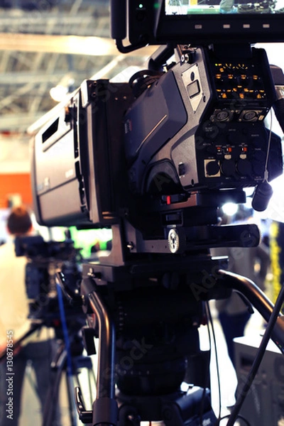 Fototapeta Video camera while filming