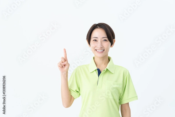 Fototapeta ミドルの介護福祉士の女性