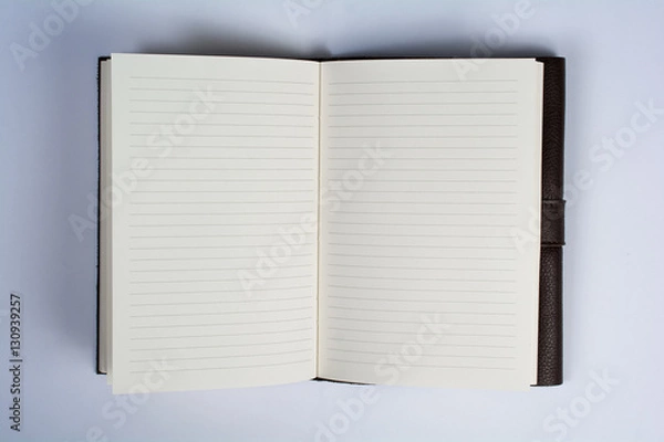 Fototapeta Bound Leather Journal Book Opened Isolated on White Top View Clo