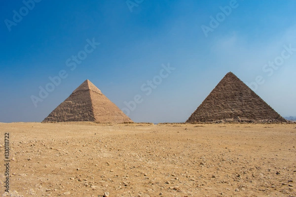 Fototapeta View of The Giza Necropolis, Famed archaeological site featuring the Great Pyramids, the Great Sphinx and The Great Pyramid of Giza in the desert of Giza, Cairo, Egypt.