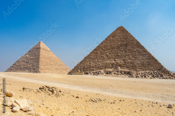 Fototapeta View of The Giza Necropolis, Famed archaeological site featuring the Great Pyramids, the Great Sphinx and The Great Pyramid of Giza in the desert of Giza, Cairo, Egypt.