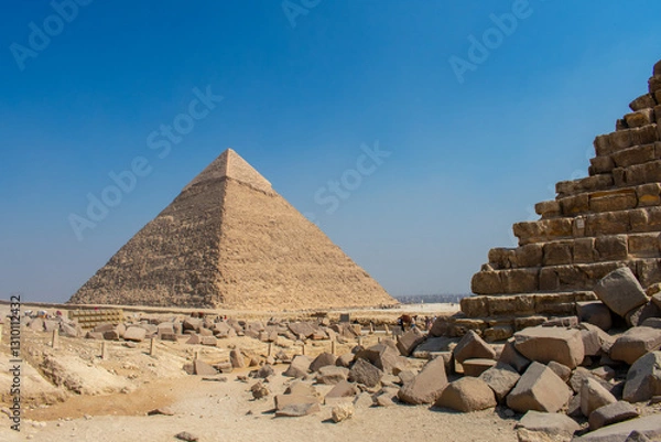Fototapeta View of The Giza Necropolis, Famed archaeological site featuring the Great Pyramids, the Great Sphinx and The Great Pyramid of Giza in the desert of Giza, Cairo, Egypt.