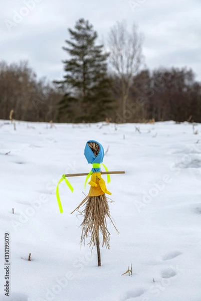 Obraz Scarecrow of winter in the snow. Maslenitsa. Farewell to winter.