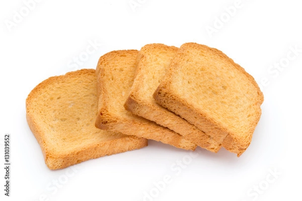 Fototapeta Slices of toast bread on wooden table, top view.