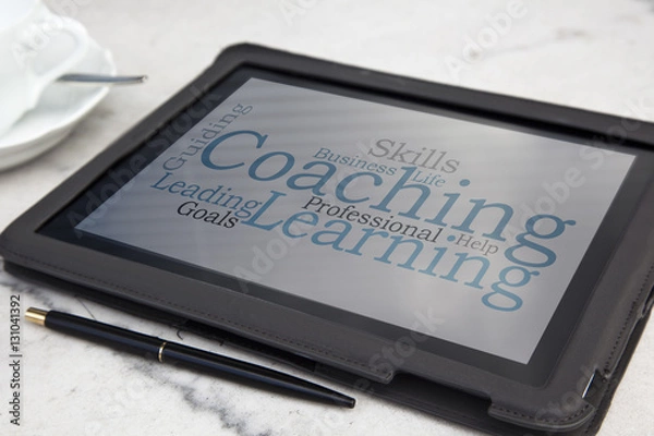 Fototapeta tablet with personal coaching word cloud