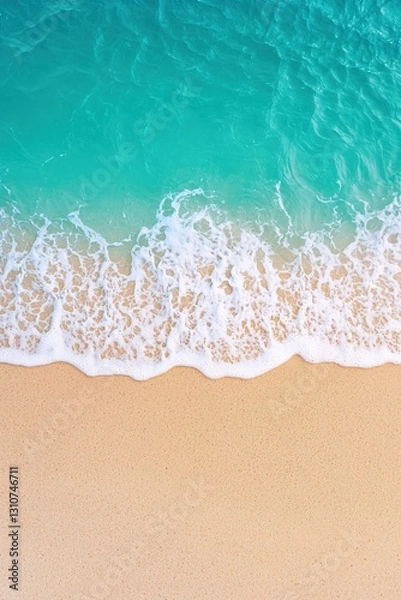 Fototapeta Clean beach with waves washing over footprints, symbolizing serenity and environmental care