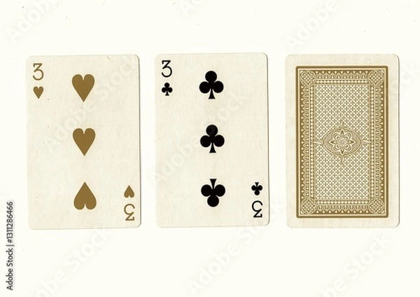 Fototapeta A hand of playing cards with a pair of the same value revealed in sepia.