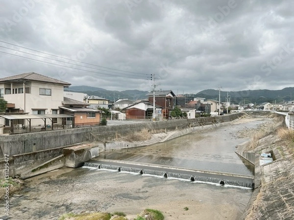 Obraz 川と住宅街