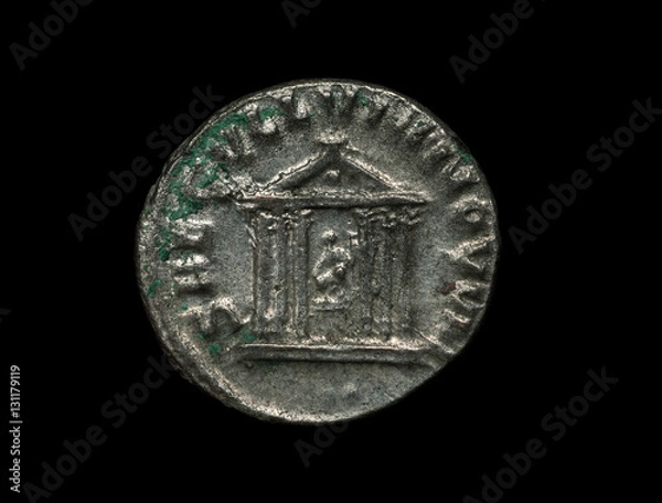 Fototapeta Ancient silver roman coin with image of a temple isolated on black