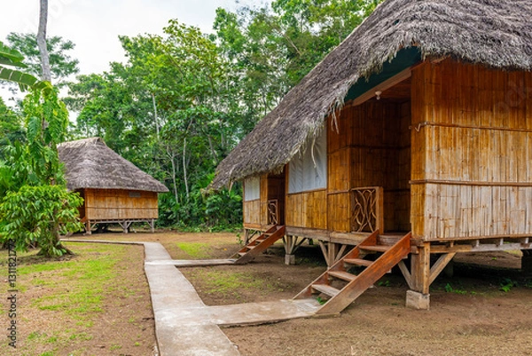 Fototapeta Traditional amazon rainforest house architecture in a kichwa indigenous community, Yasuni national park, Ecuador.