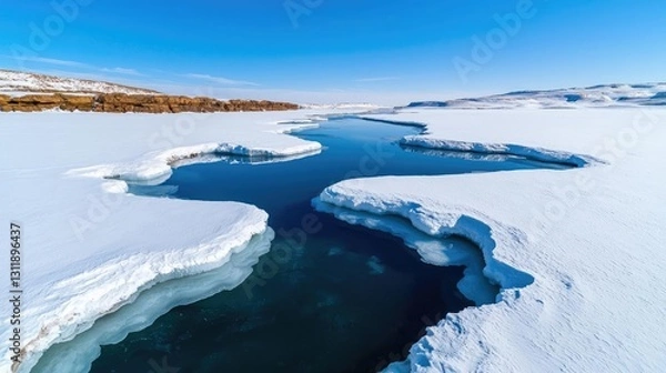 Fototapeta Iceberg melting idea. Expansive icy landscape with a serene blue river cutting through the snow.