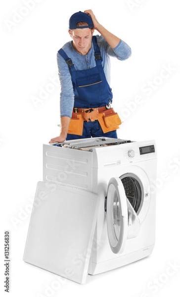Obraz Plumber with washing machine on white background