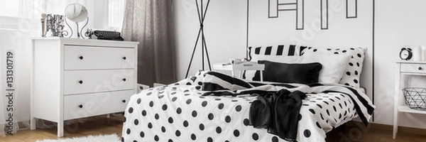 Obraz Light bedroom with patterned bedding