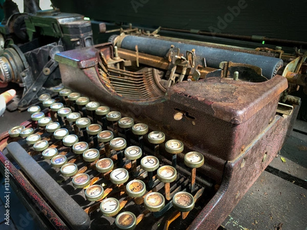 Fototapeta Old rusty antique typewriter on the table