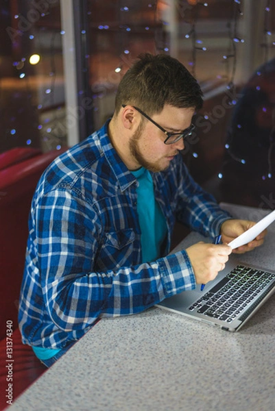 Obraz man working in cafe